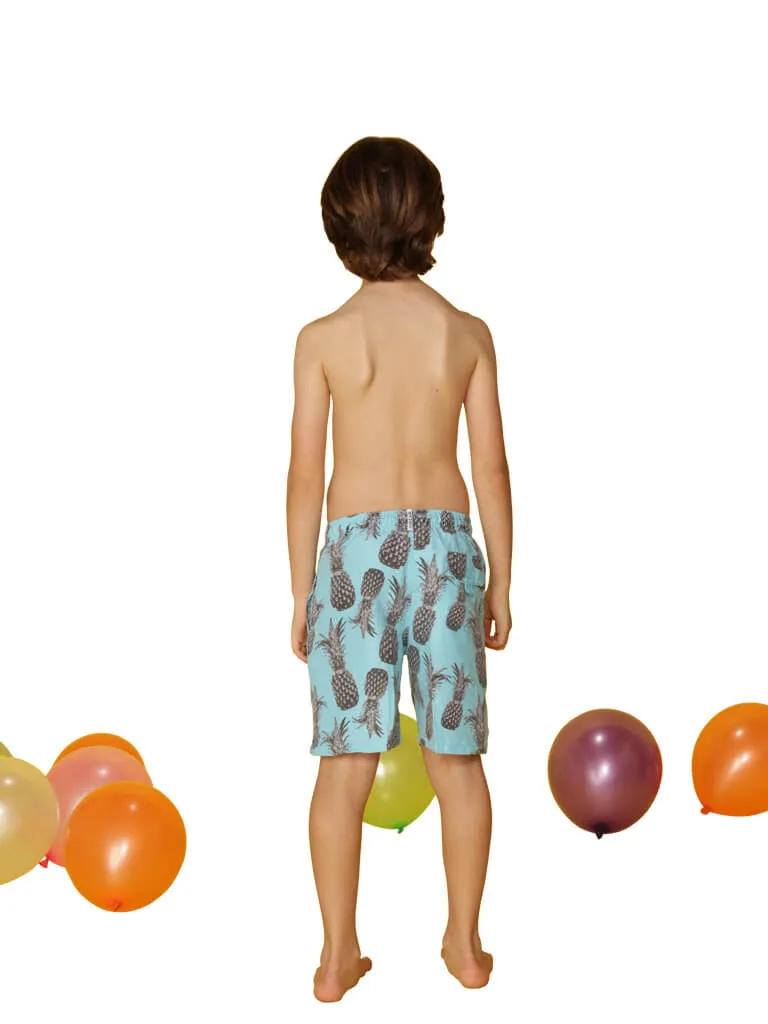 CKLS25 Boys Swim Trunks printed in a spray of pineapples