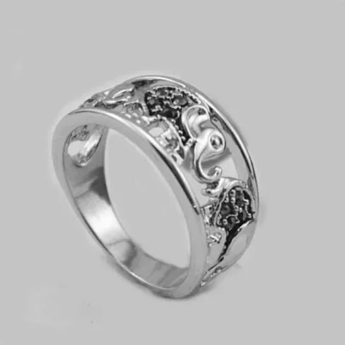 Trunks And Tails Playful Elephants Ring